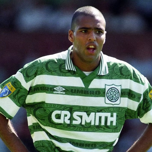 Celtic FC player wearing the 1994-95 home kit with green and white hoops, CR Smith sponsor, and Umbro logo