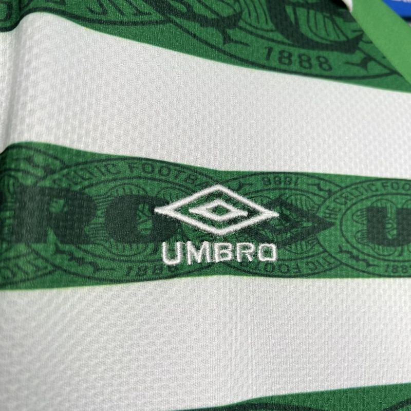 Detail of the Umbro logo embroidered on the 1995 Celtic FC home shirt's green hoop