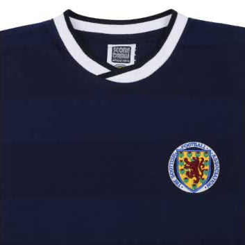 Close-up of the upper section of a dark blue Scotland 1986 football shirt with white collar and Scottish FA crest on the chest.